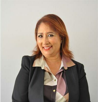 Coloured woman wearing a black jacket