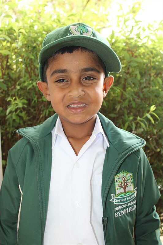 Indian boy wearing a cap