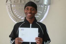 Boy holding an envelope