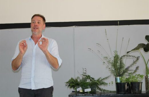 Man photographed while speaking