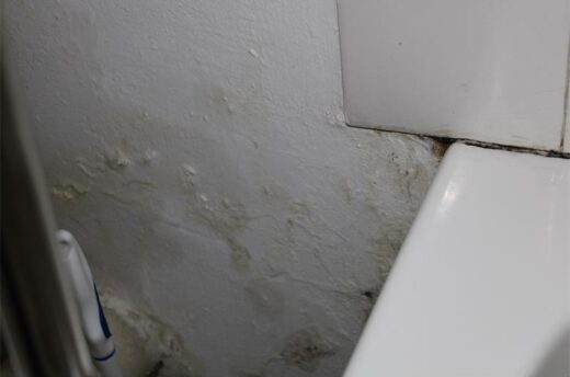 White wall with bulging paint