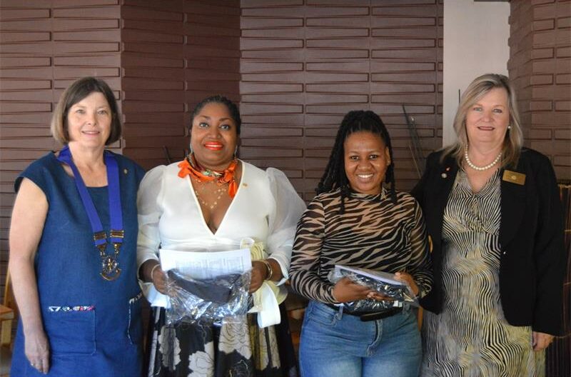 Four women, two white and black