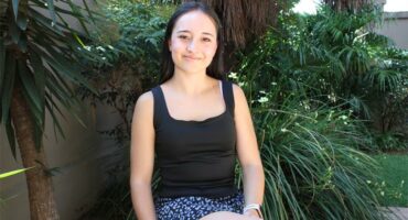 Girl sitting on a bench