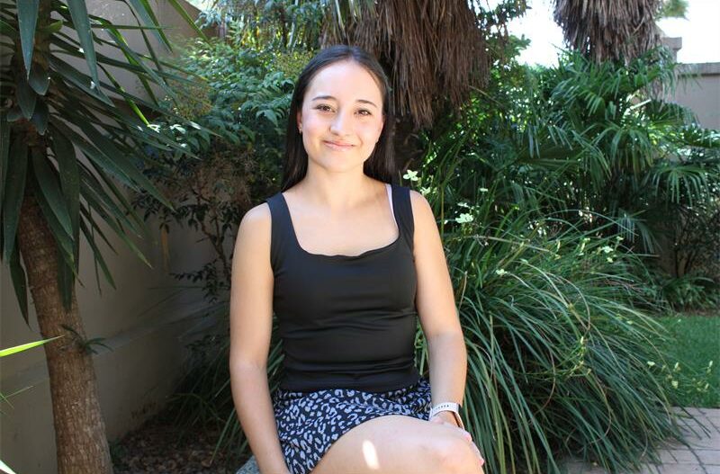 Girl sitting on a bench