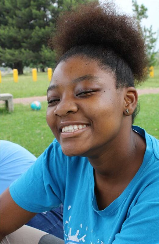 Young black woman wearing a blue shirt
