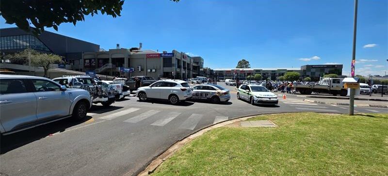 Photo of different cars blocking the road