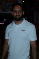 Indian man wearing a white shirt