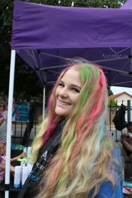 Blonde girl with multi-coloured hair