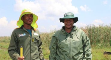 Two people standing next to each other.