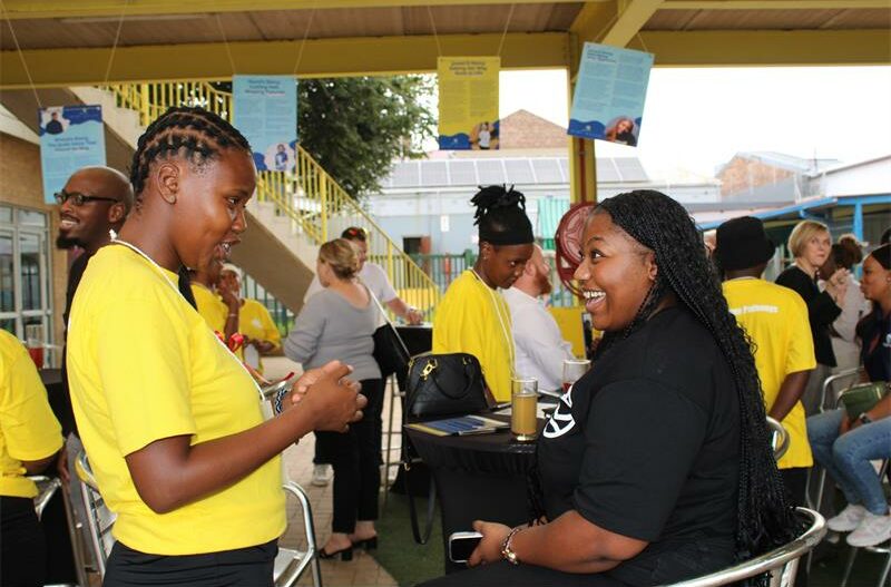 Two black women casually talking