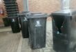 Photo of black wheelie bins