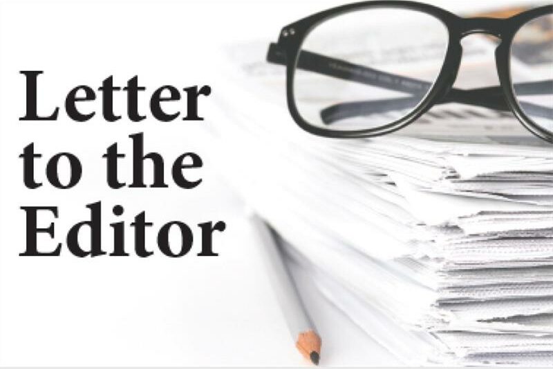 A black and white image of reading glasses on top of a pile of papers and a pencil next to this with the wording Letter to the Editor.