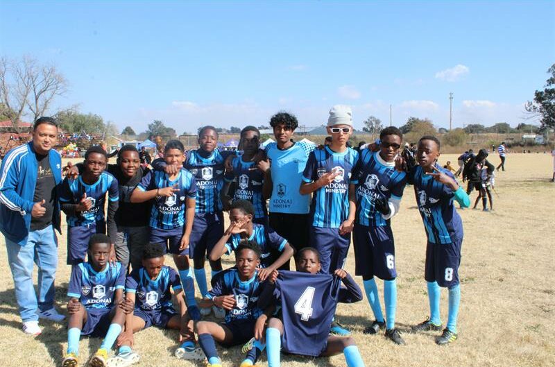 Group of boys wearing football kits