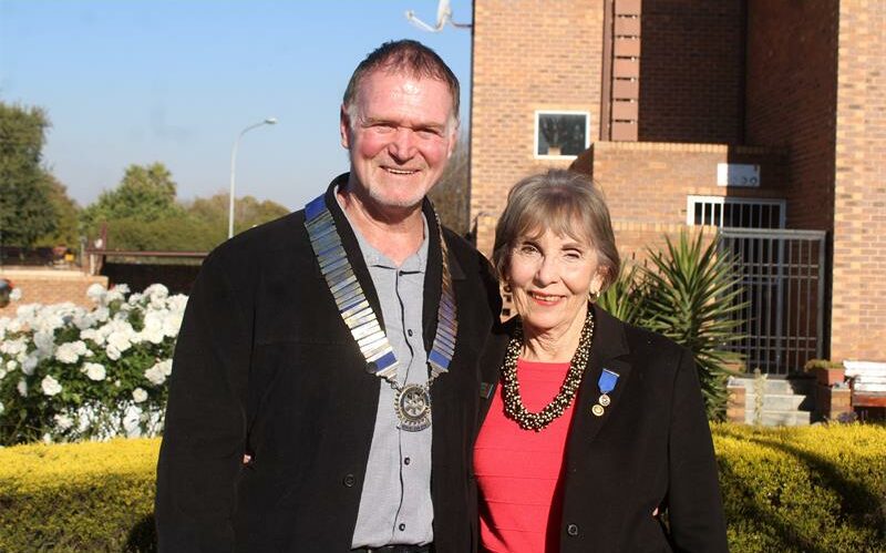 Man and woman smiling at the camera