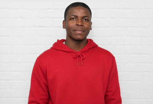 Young black man wearing a red shirt