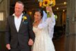 Photo of a bride and groom leaving a church