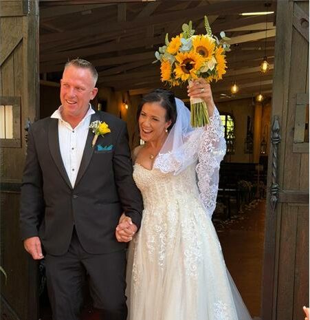 Photo of a bride and groom leaving a church