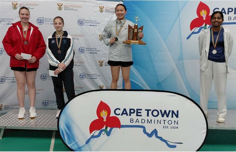 She claimed a straight set 21-10, 21-16 victory over Chidvi Panjala to win the women's singles title, before adding a gold and bronze in the doubles.