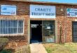 Building with sign indicating thrift shop