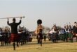 Group of people playing bag pipes
