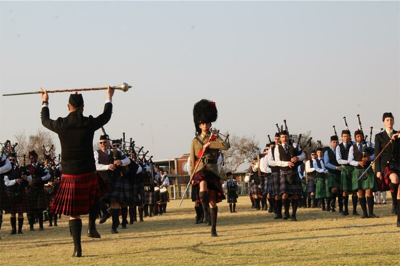 Group of people playing bag pipes