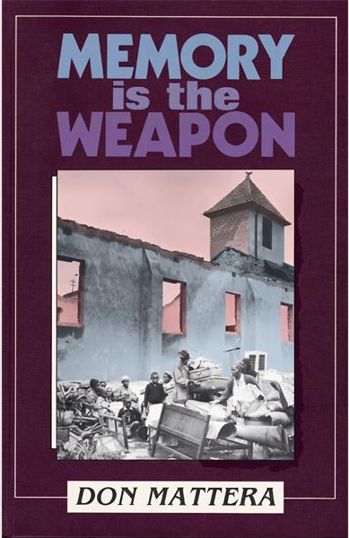 A book entitled Memory is the Weapon with an image of an old building.