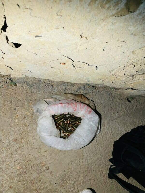Ammunition in a small white bag.