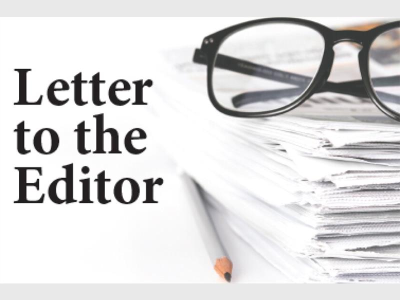 A black and white image showing the words Letter to the Editor, a stack of papers, a pair of reading glasses and pencil.