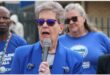 women in blue political regalia