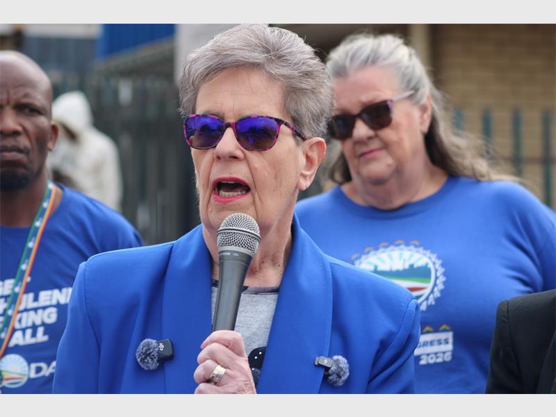 women in blue political regalia