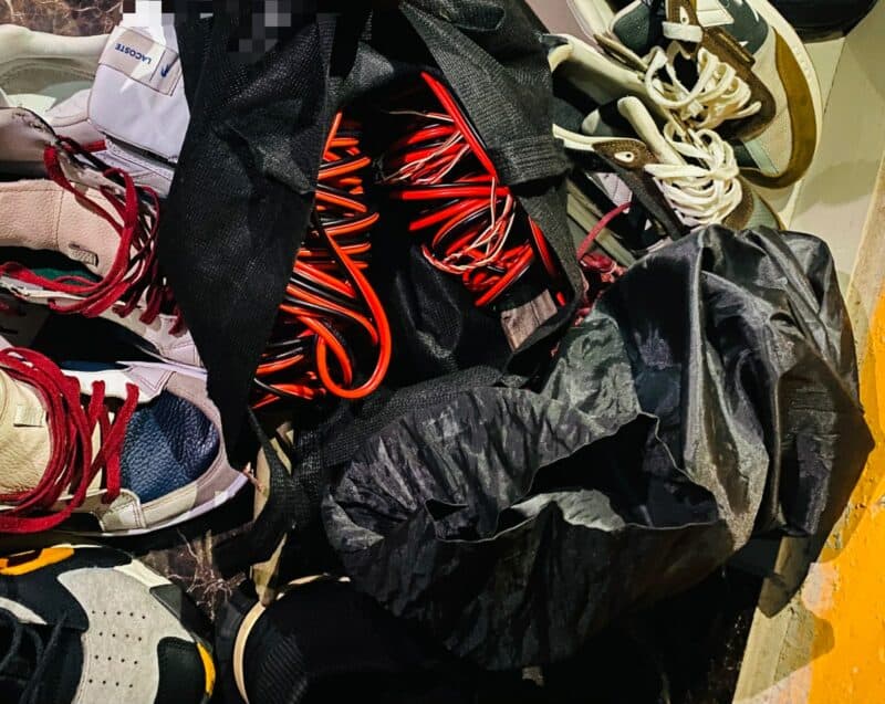 Black bags containing red cables