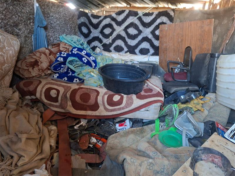 Messy room with blankets and bedding