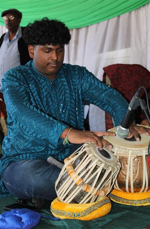 Indian man playing drums