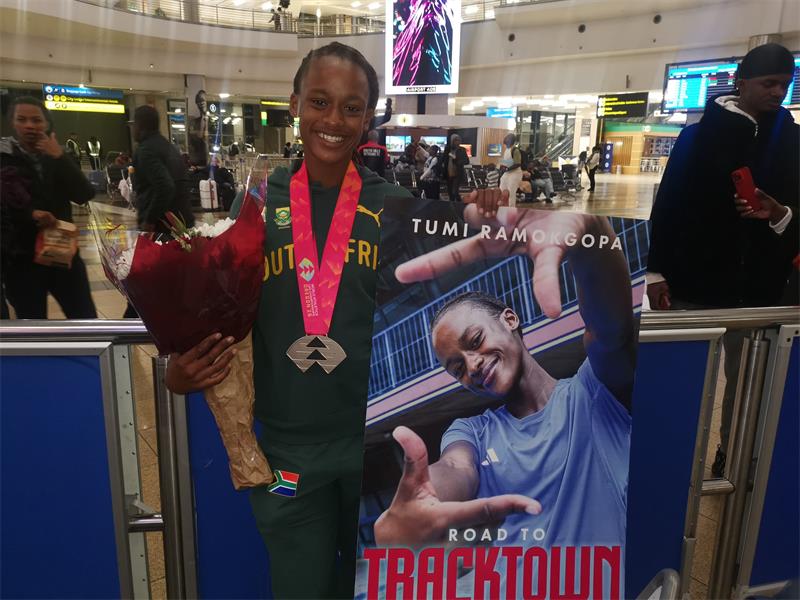 She won a silver in the women's 100m and 400m hurdles at the World Athletics Junior Chmpionships in the USA.