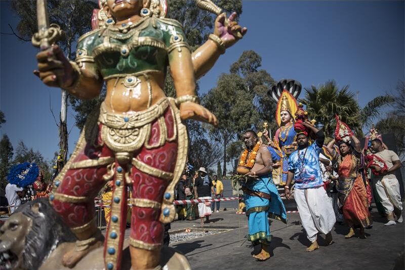 A group of Indian people walking