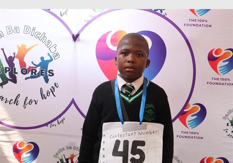 A boy wearing black uniform and the number 45