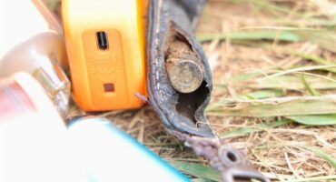 Picture showing the back of a bullet hidden in a strap