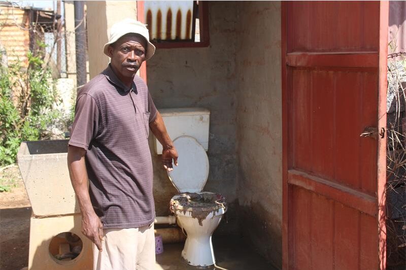 Doctor Phiri's toilet became blocked and sewer water started overflowing.
