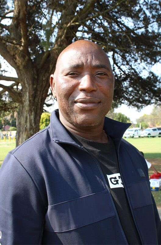 Black man in an open setting