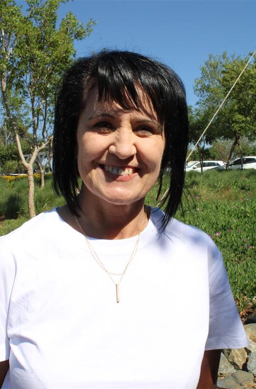 Woman with mid-length dark hair