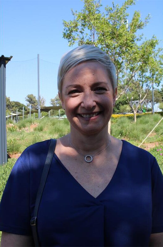 Woman with short blonde hair