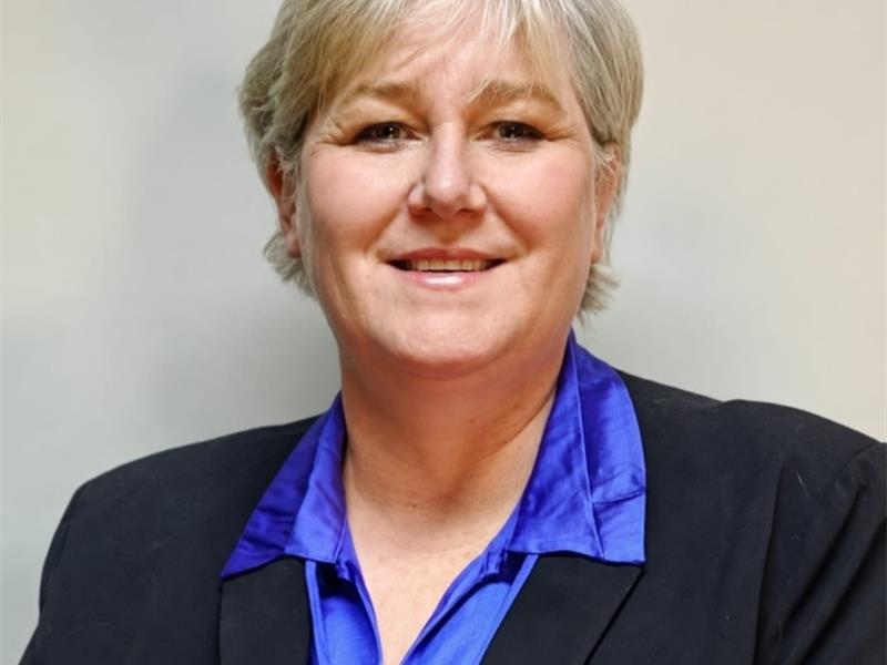 White woman smiling