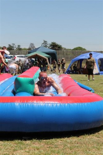 Police members enjoyed a variety of fun activities during their year-end function on Friday, last week. WO Mark Fourie had a splash on the slip-and-slide.