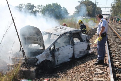 It is believed the car's driver drove onto the track in front of the oncoming train.