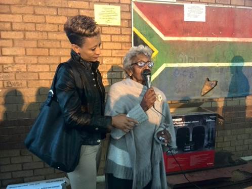 Elizabeth Du Plessis (101 years old) on left assisted with the motivation of learners