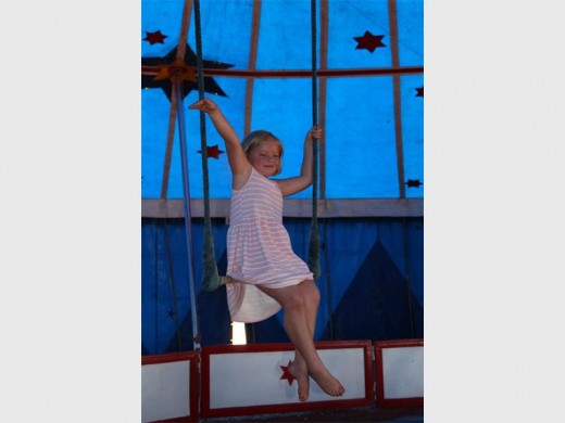 Kaelyn Muniz (7) learned how to sit correctly on a static trapeze, at the circus workshop, which takes place at the circus tent situated opposite the Pocket Park at Carnival City..