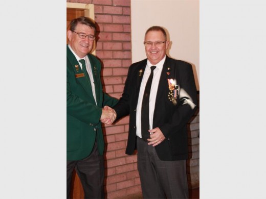 SA Legion national president Lgr Godfrey Giles (left) congratulates Brakpan branch member Lgr Shawn Simpson.