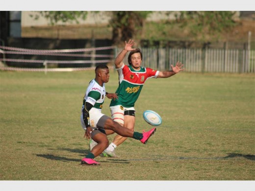 Brakpan fullback Hagen Mumba chips the ball over the head of a False Bay opponent, during Saturday’s Gold Cup match, at Bosman Stadium.
