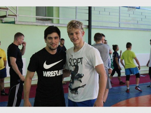 Matthew Bartlett of Brakpan Wrestling Club (right) with 57kg Olympic gold medallist Vladimer Khinchegashvili.