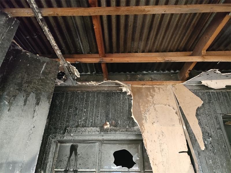 When the Brakpan Herald arrived on the scene, the roof was still smouldering.